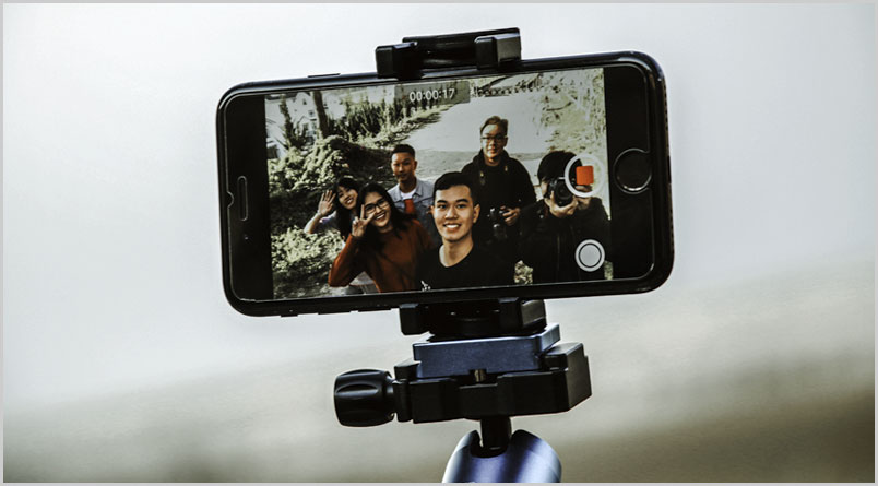 Photo of a video greeting being recorded on a cell phone