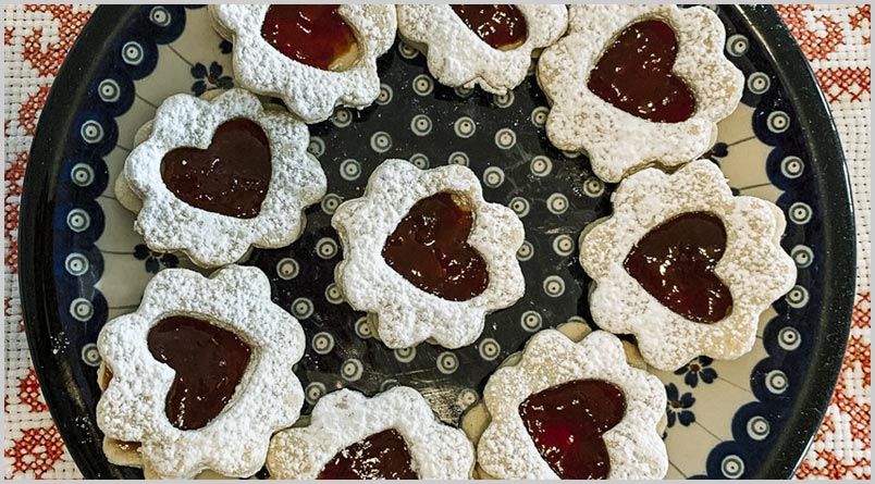 A photo of a plate of Linzer Cookies