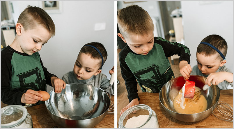 A photo of the two older boys adding ingredients while making the dumplings