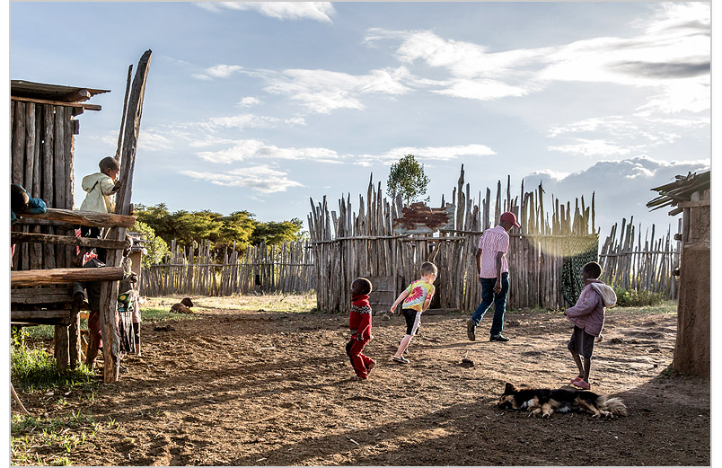 Caleb playing with Kenyan kids.