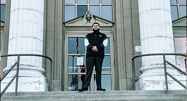 Napoleon standing in front of a courthouse
