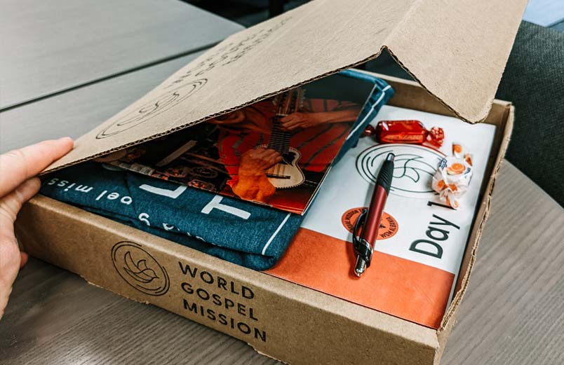 A welcome box from WGM containing materials for a virtual mission trip