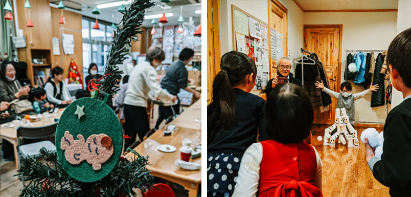 A group of people in a room decorated for Christmas and children in an open area playing a game