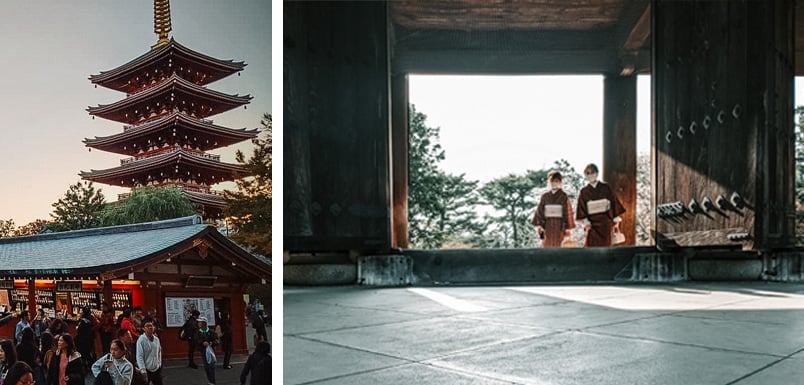 A temple in a city with many people walking around its base and two people standing at the tall threshold into a temple