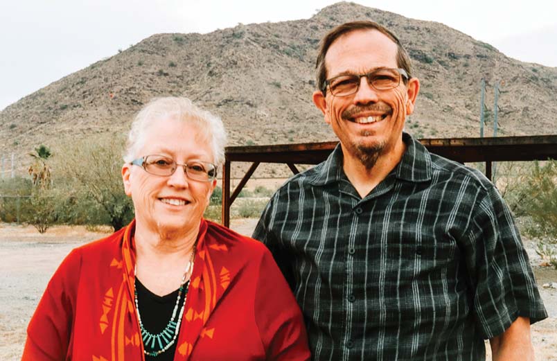 Debbie and Steve Cartwright standing in front of South Mountain