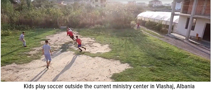 Photo of kids playing soccer outside the current ministry center in Vlashaj, Albania (1)